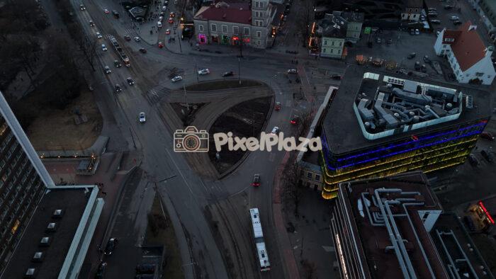 Aerial Drone View of Viru Square Traffic and City Streets in Tallinn, Estonia at Dusk