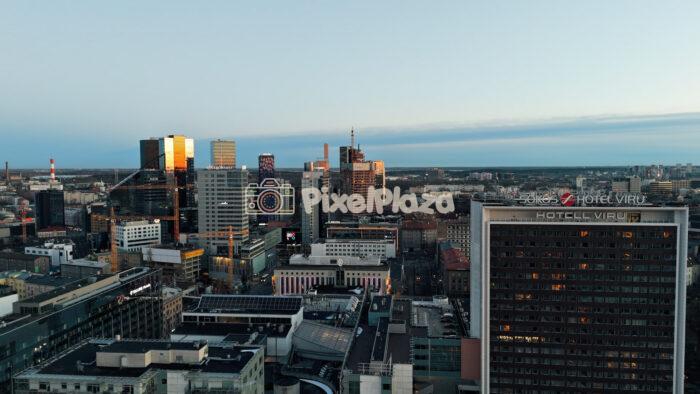 Aerial Skyline of Modern Tallinn City Center with Viru Hotel at Sunset, Estonia