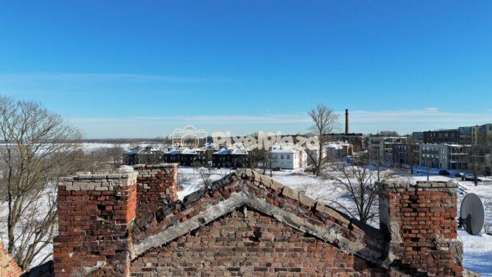 Drone View of Historic Brick Ruins and Modern Homes in Kopli Liinid, Tallinn Estonia Winter