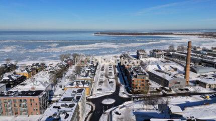 Winter Drone View of Kopli Liinid Coastline and Baltic Sea Ice, Tallinn Estonia
