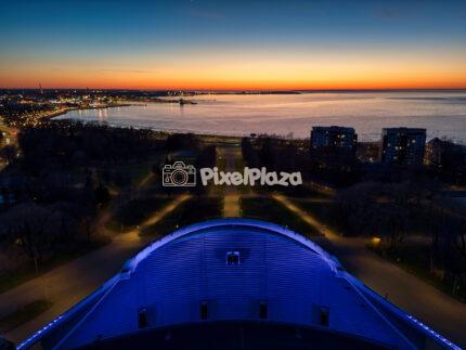 Drone View of Tallinn Song Festival Grounds Stage at Sunset Overlooking Baltic Sea