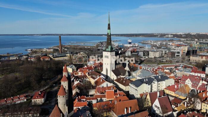 Tallinn Old Town aerial skyline with St Olafs Church and Baltic coast