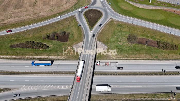 Aerial Drone View of Highway Interchange and Roundabout Traffic
