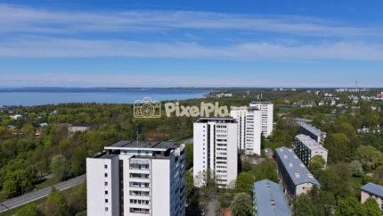 Drone panorama of Tallinn Majaka high rise buildings with sea view
