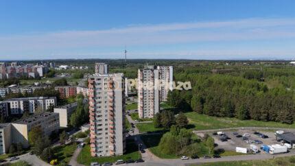 Drone view of Lasnamäe apartment buildings and TV tower in Tallinn