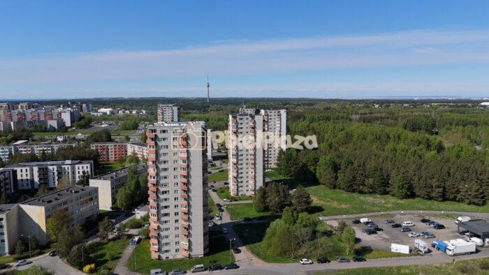 Drone view of Lasnamäe apartment buildings and TV tower in Tallinn
