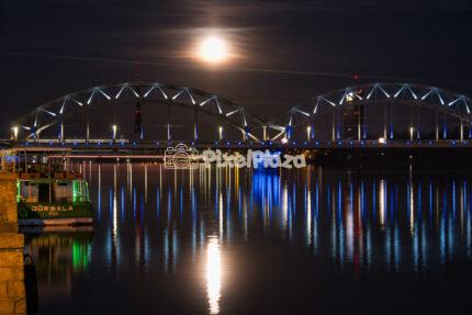 Riga Railway Bridge Night Scene with Full Moon Reflection