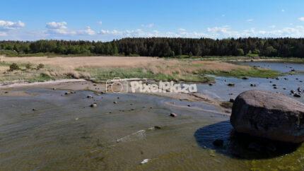 Ehalkivi Estonia Coastal Drone View with Giant Boulder and Baltic Shoreline