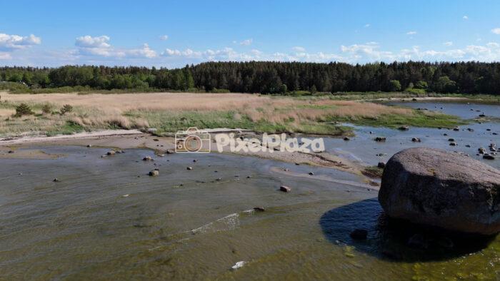 Ehalkivi Estonia Coastal Drone View with Giant Boulder and Baltic Shoreline
