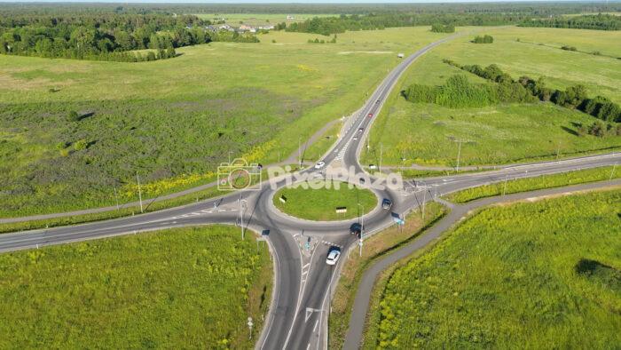 4K Aerial Drone Video of Rural Roundabout and Country Road in Summer