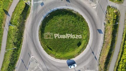 4K Drone Video Top Down Aerial View of Traffic Roundabout