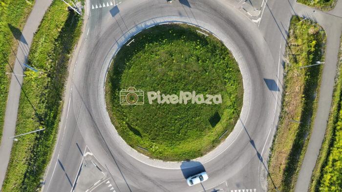 4K Drone Video Top Down Aerial View of Traffic Roundabout