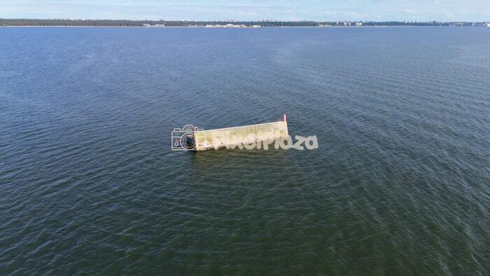 4K Drone Video of a Concrete Breakwater in the Sea Near Miiduranna Estonia