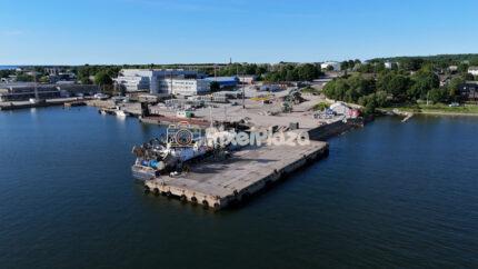 4K Drone Video of Miiduranna Harbor Pier and Commercial Boat in Estonia