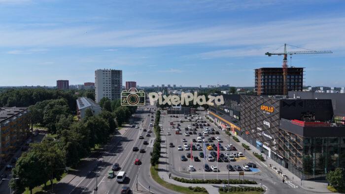 4K drone video of Mustamäe Centrum mall and city traffic in Tallinn Estonia