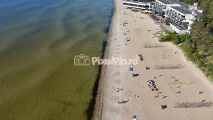 4K drone video of sunny Pirita Beach and Baltic Sea in Tallinn Estonia