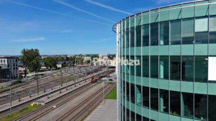 Aerial Drone View of Tallinn Baltic Train Station and Glass Building