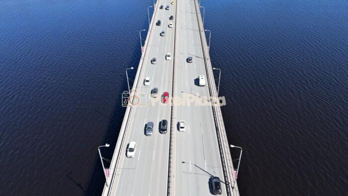 Aerial Top Down View of Cars Driving Over Island Bridge in Riga Latvia - 4k Drone Video
