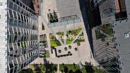 Aerial Top Down View of Modern Glass Business Center Courtyard