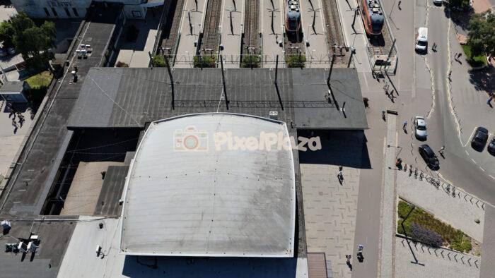 Aerial top down view of Tallinn Baltic railway station building and trains