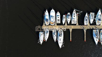 Top Down Drone 4K Video Of Luxury Sailboats And Yachts Docked At A Pier