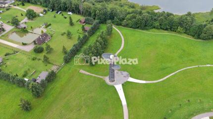 Aerial Drone Tracking Shot over Modern Countryside Observation Tower