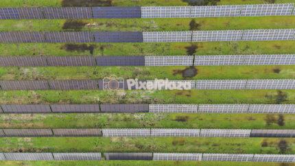 Aerial Top Down Video Flying Over Solar Panel Farm