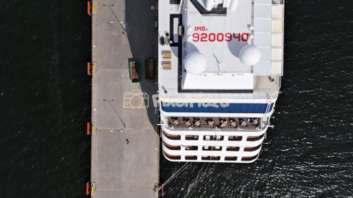 Aerial Top Down Video Of Cruise Ship Docked At Pier