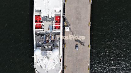 Aerial Top Down View of Passenger Ship Docked at Pier