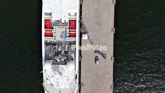 Aerial Top Down View of Passenger Ship Docked at Pier