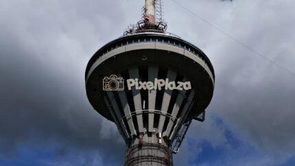Aerial View of Futuristic Television Tower Top - 4K Drone Video