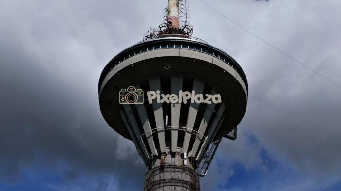 Aerial View of Futuristic Television Tower Top - 4K Drone Video