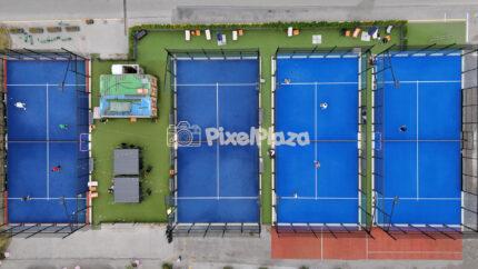 Top Down Aerial Video of People Playing Outdoor Padel Tennis