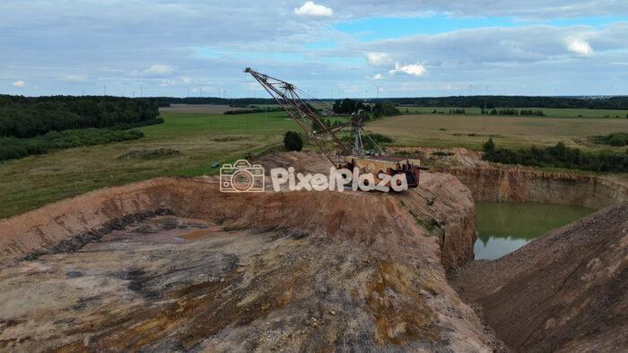 A giant bucket-wheel excavator filmed by drone