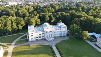 Aerial Drone Flight Over Grand Historic Palace and Lush Park